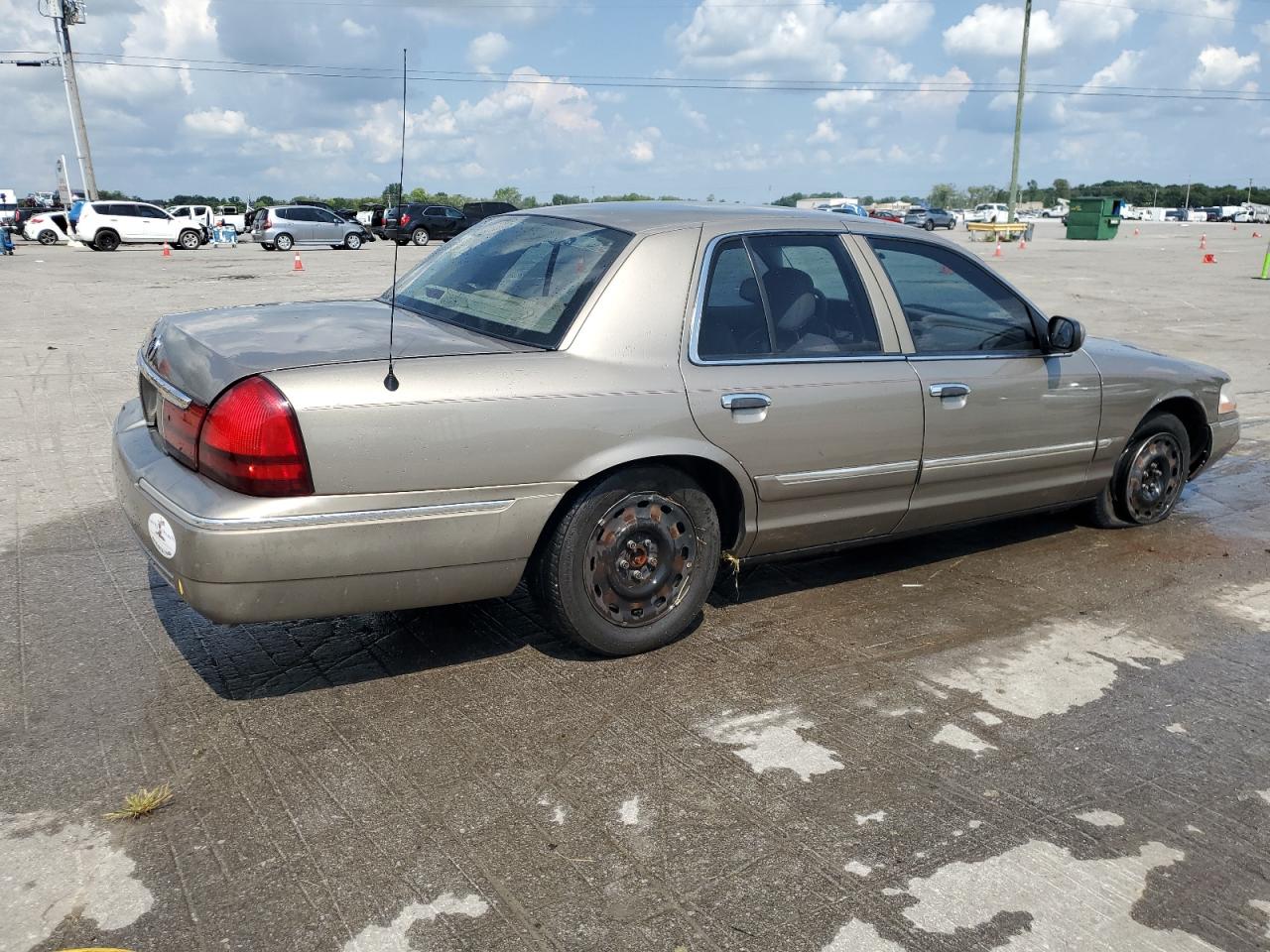 2005 Mercury Grand Marquis Gs beige null gas 2MEFM74W75X646293 photo #4