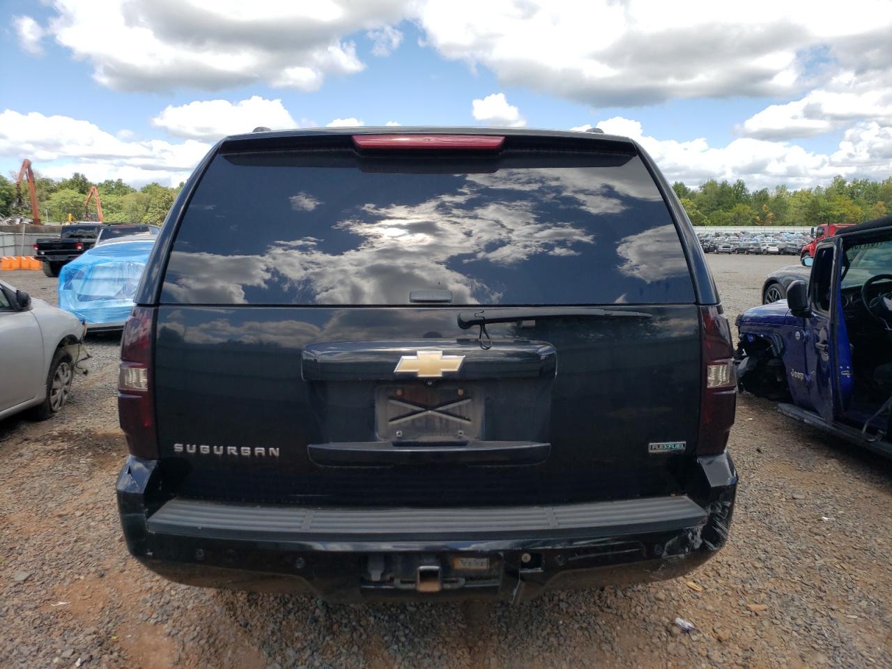 2011 Chevrolet Suburban K1500 Ls VIN: 1GNSKHE35BR376672 Lot: 69775825