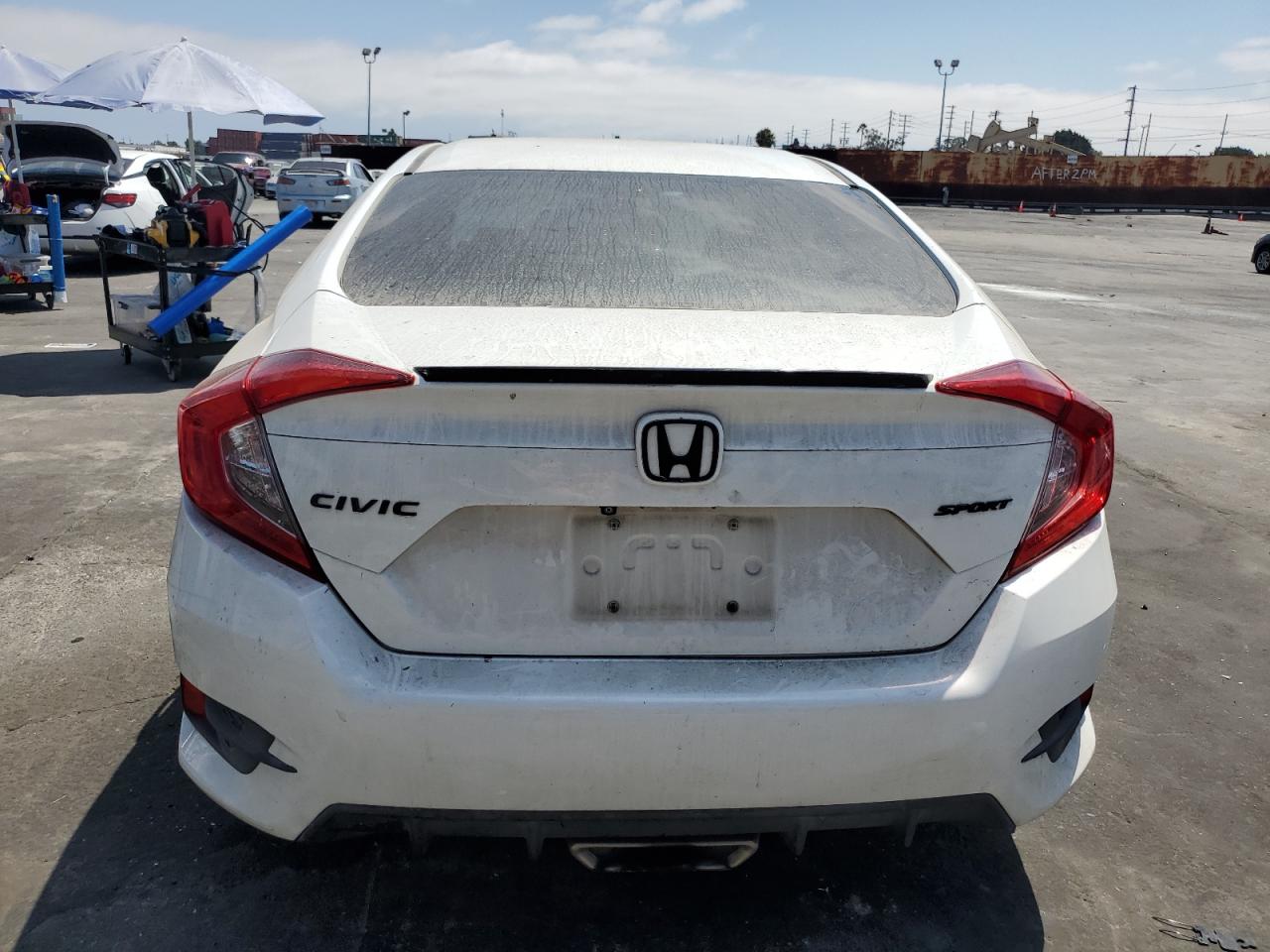 2019 Honda Civic Sport VIN: 19XFC2F8XKE015819 Lot: 68704235