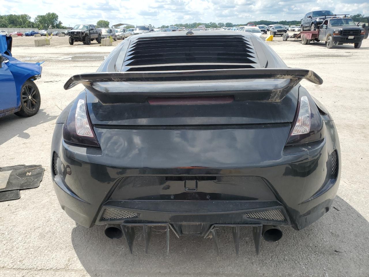 2009 Nissan 370Z VIN: JN1AZ44E39M400442 Lot: 68454255