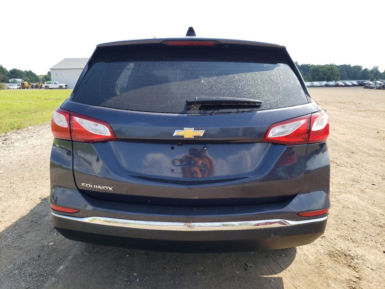 2018 Chevrolet Equinox Ls VIN: 3GNAXHEV8JS621670 Lot: 69202355