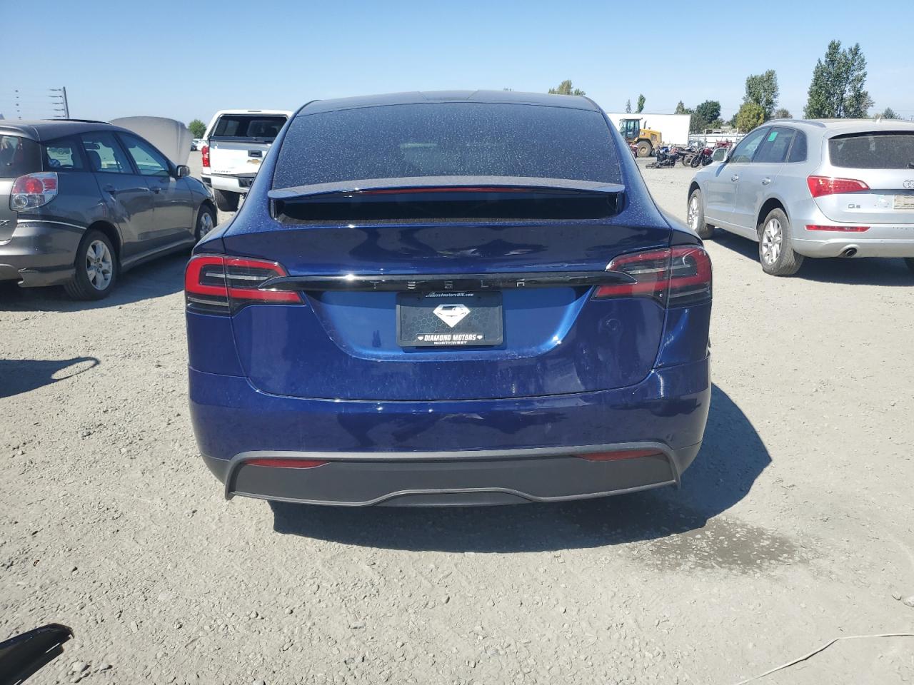 2023 Tesla Model X VIN: 7SAXCBE52PF411615 Lot: 70066735