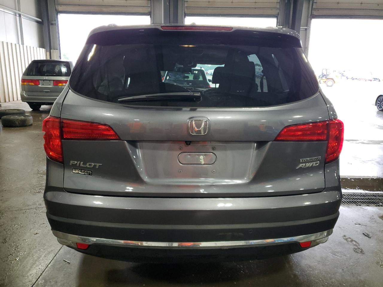 2016 Honda Pilot Touring VIN: 5FNYF6H97GB101586 Lot: 69478945