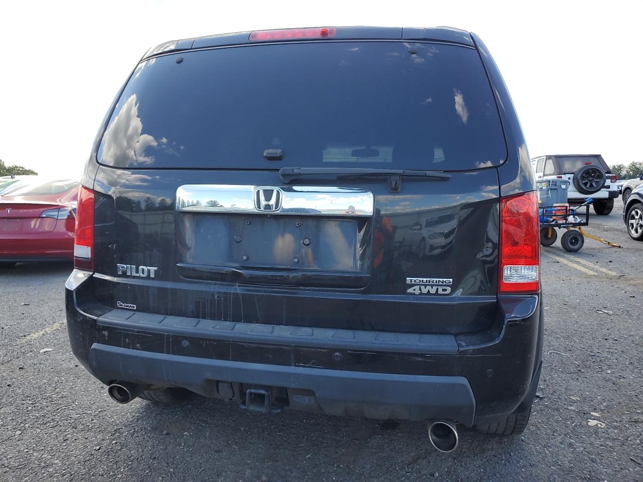 2011 Honda Pilot Touring VIN: 5FNYF4H91BB049448 Lot: 70707135