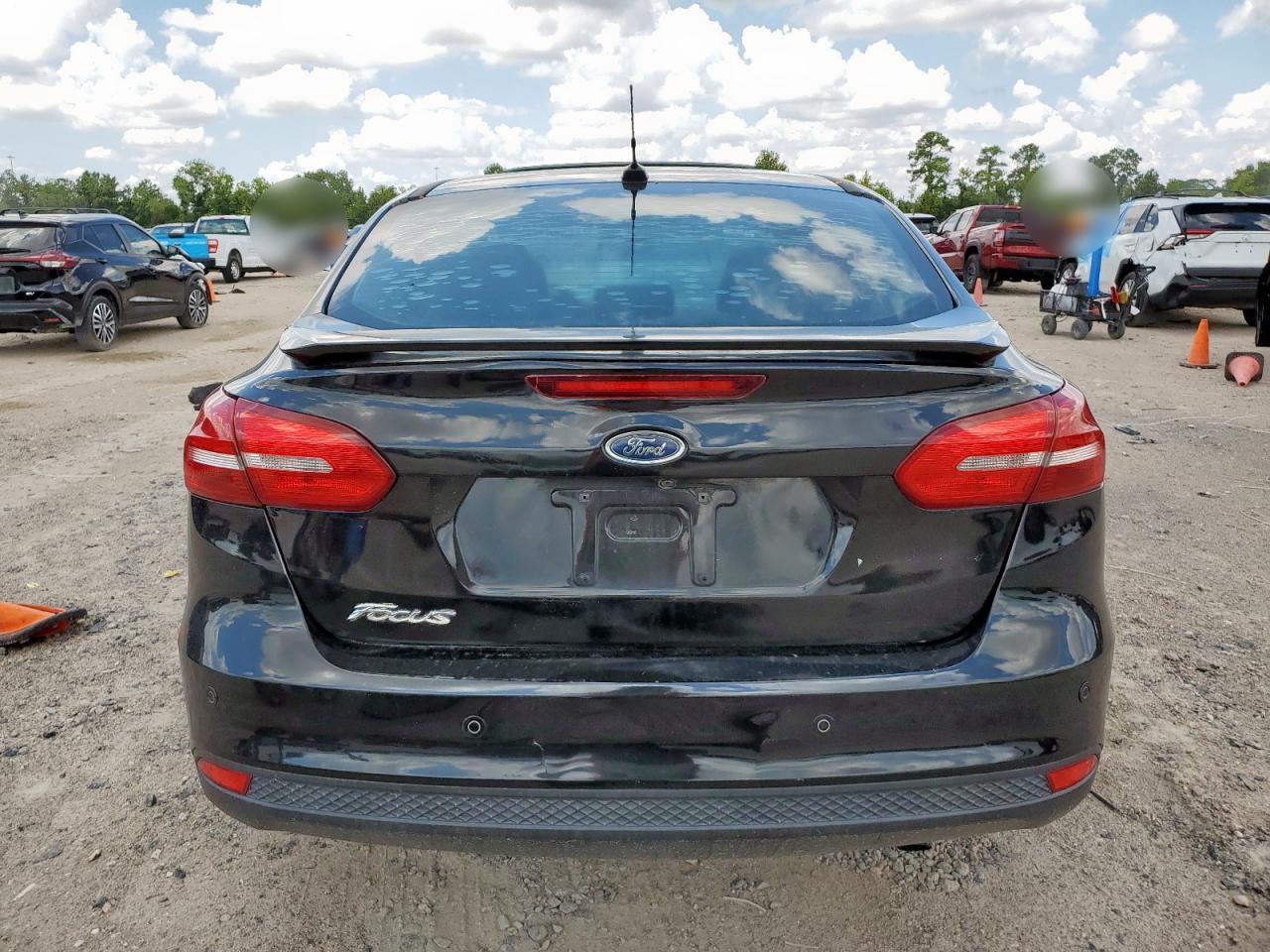 2015 Ford Focus Titanium VIN: 1FADP3J28FL386663 Lot: 68867985