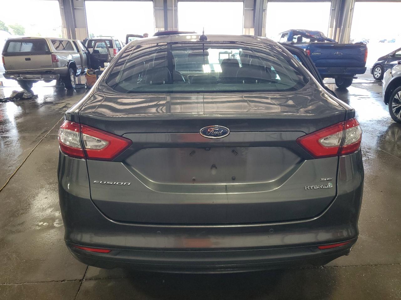 2016 Ford Fusion Se Hybrid VIN: 3FA6P0LU5GR404870 Lot: 69613775