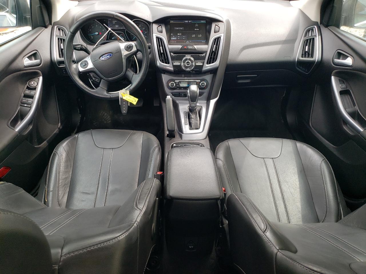 2014 Ford Focus Titanium VIN: 1FADP3J27EL205504 Lot: 97222515