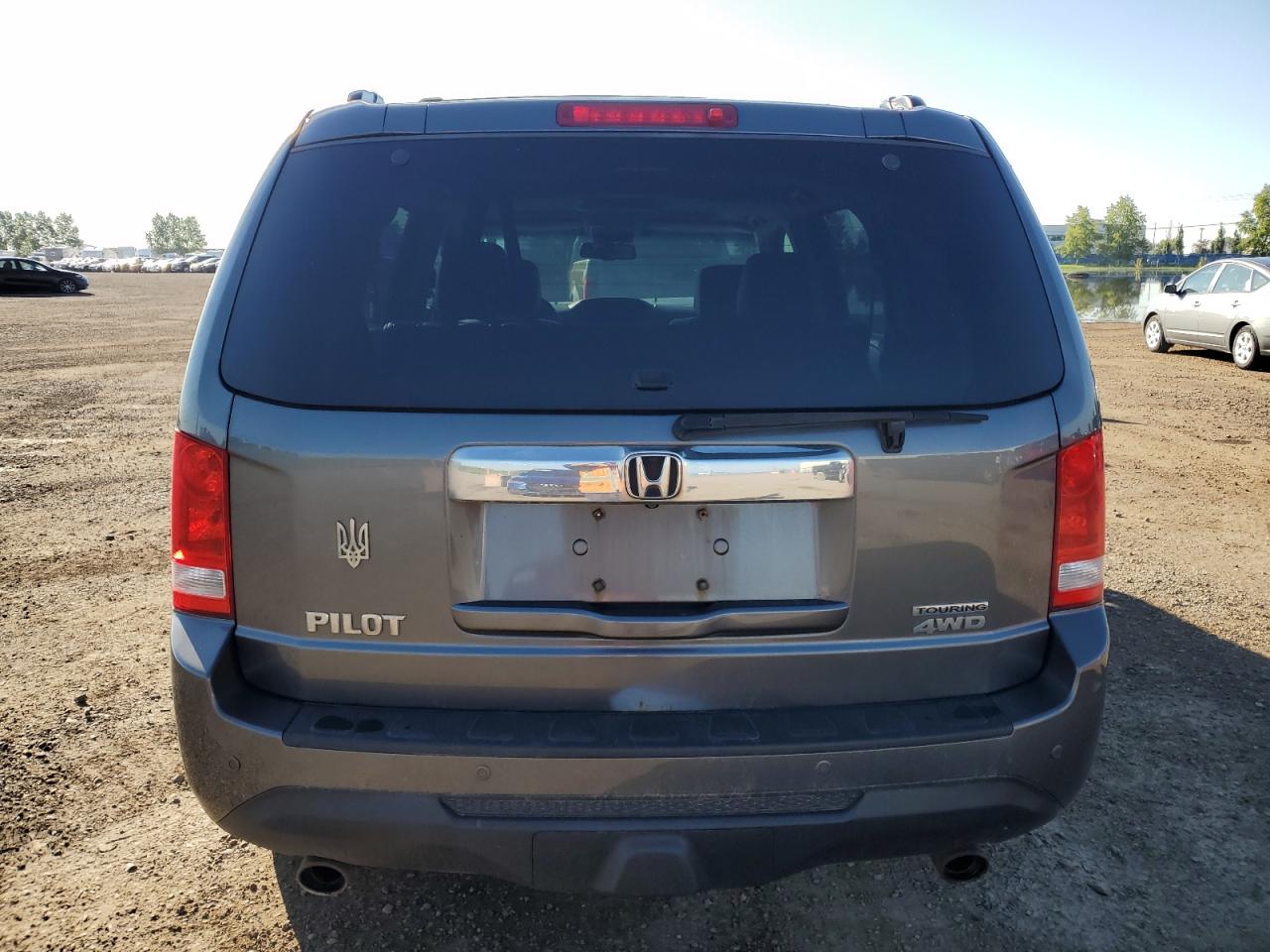 2012 Honda Pilot Touring VIN: 5FNYF4H9XCB501365 Lot: 68295875
