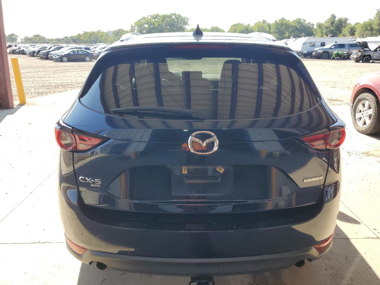 2021 Mazda Cx-5 Grand Touring VIN: JM3KFBDM1M0409704 Lot: 67669875