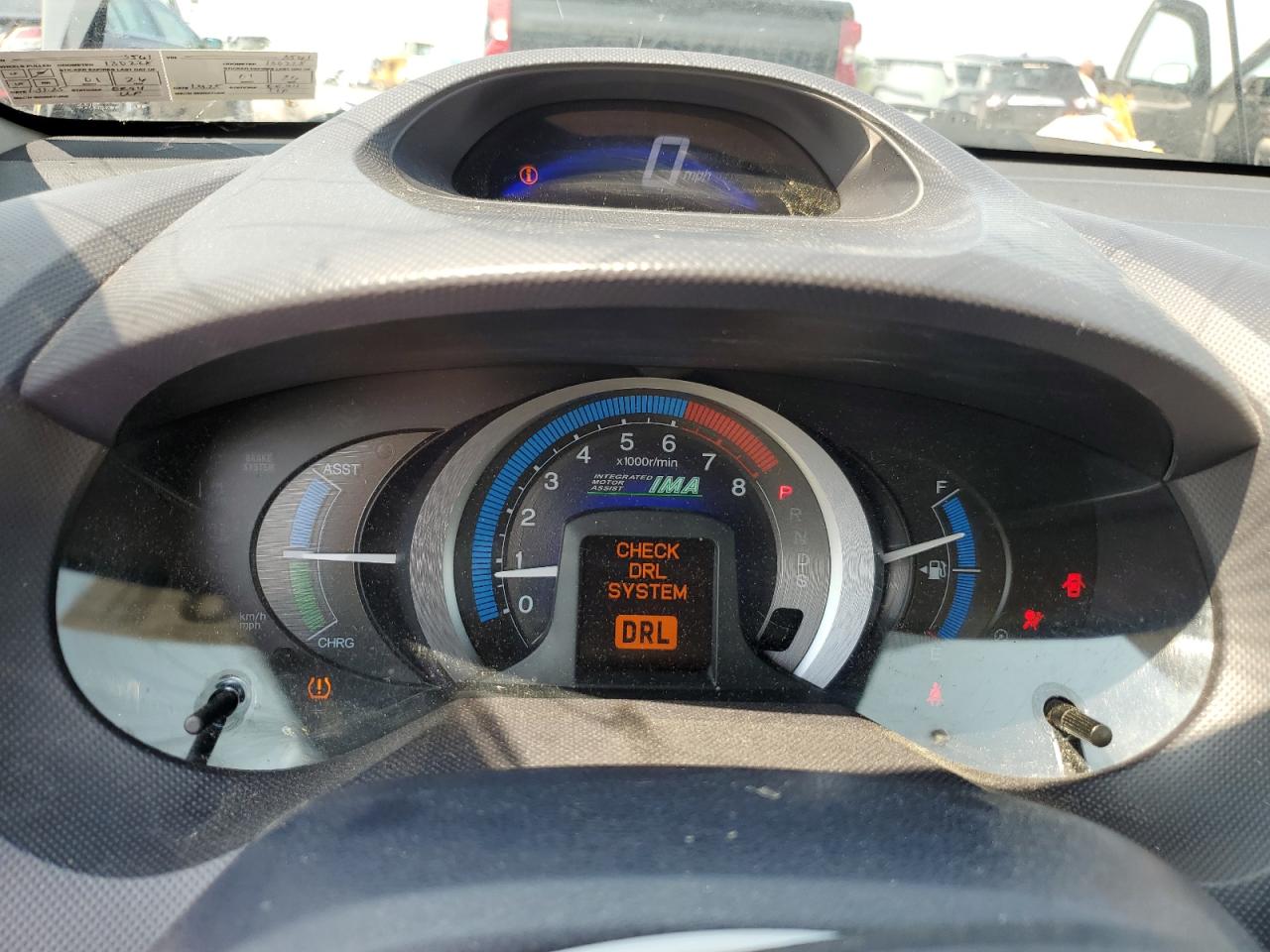 2010 Honda Insight Ex VIN: JHMZE2H77AS023561 Lot: 66636015