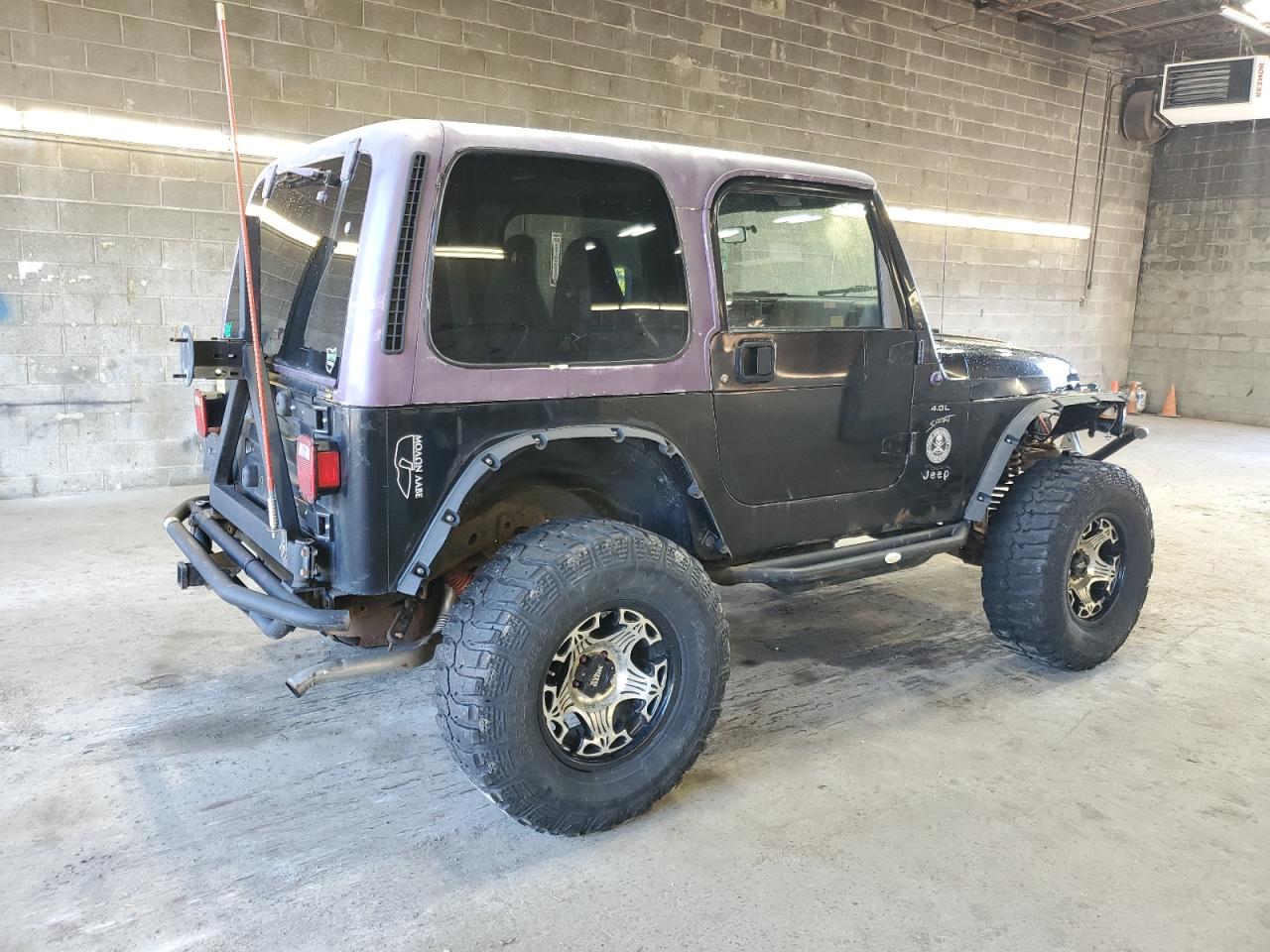 1998 Jeep Wrangler / Tj Sport black null gas 1J4FY19S4WP724572 photo #4