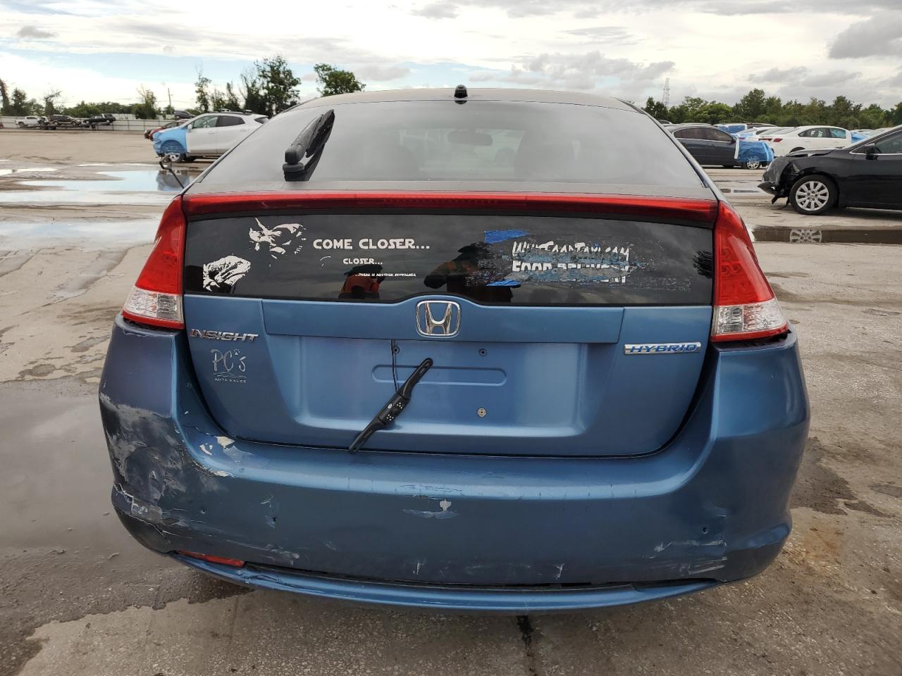 2010 Honda Insight Ex VIN: JHMZE2H73AS017028 Lot: 69970605