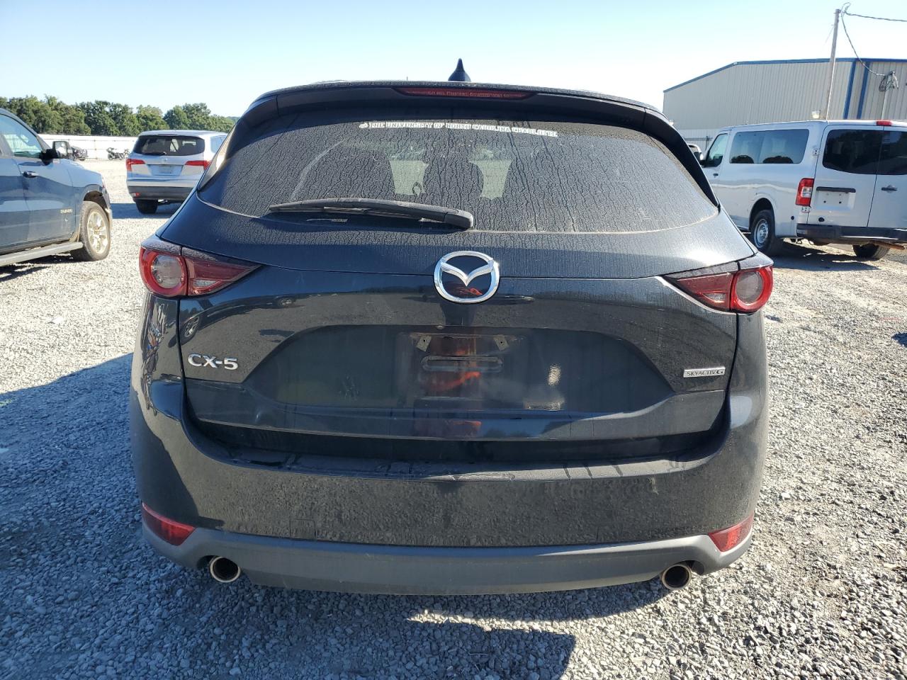 2021 Mazda Cx-5 Touring VIN: JM3KFACM3M1351858 Lot: 70878725