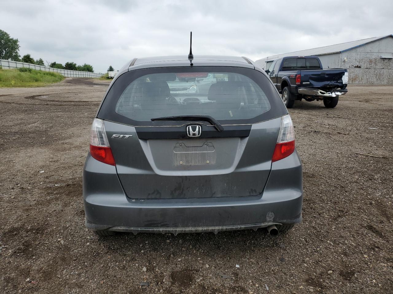 2013 Honda Fit VIN: JHMGE8H3XDC064062 Lot: 68765385