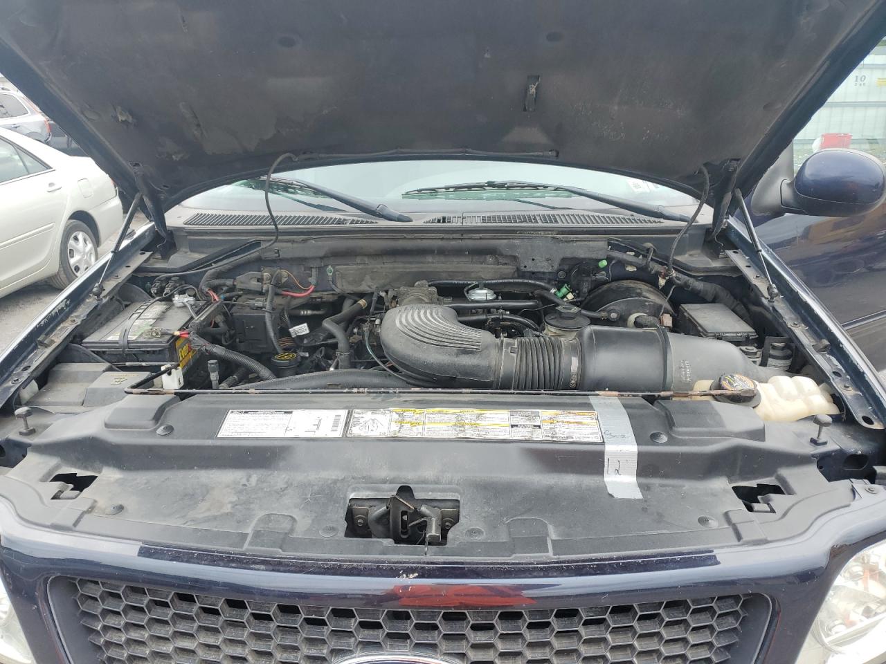 2001 Ford F150 VIN: 1FTRX18L81NA77212 Lot: 69253605