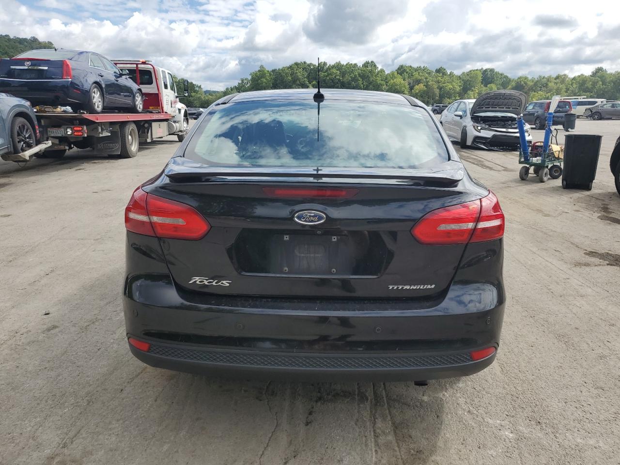 2017 Ford Focus Titanium VIN: 1FADP3J22HL218861 Lot: 69978805