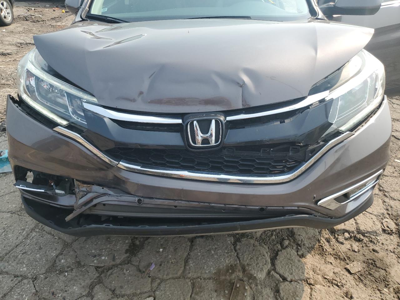 2015 Honda Cr-V Exl VIN: 2HKRM4H7XFH691960 Lot: 67125625