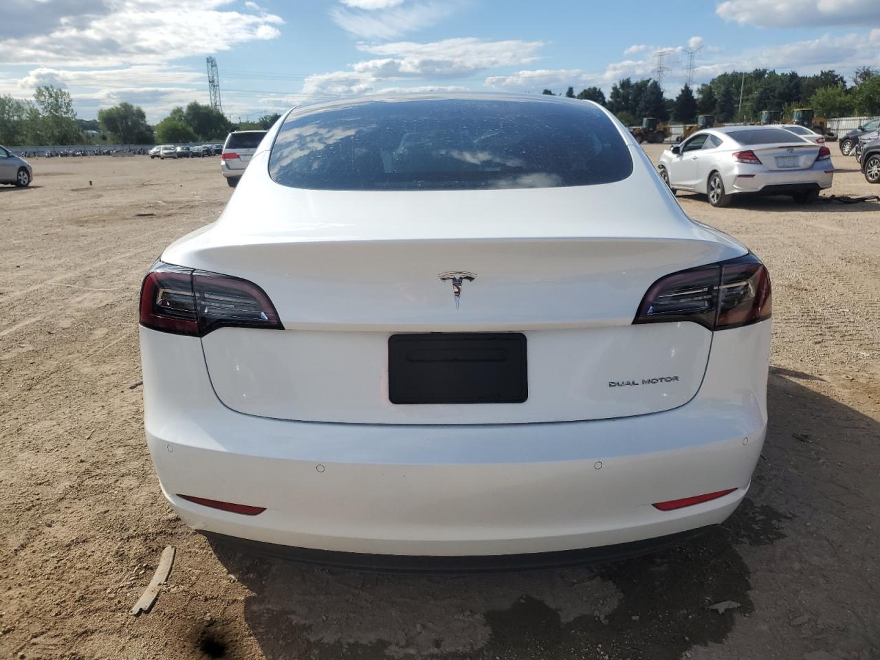 2022 Tesla Model 3 VIN: 5YJ3E1EB1NF323285 Lot: 69807695
