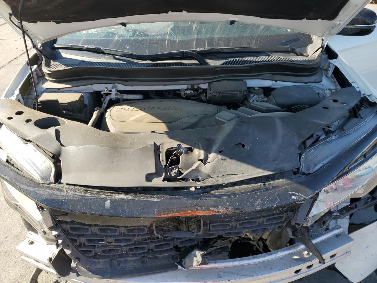 2021 Honda Passport Elite VIN: 5FNYF8H08MB037258 Lot: 70494095