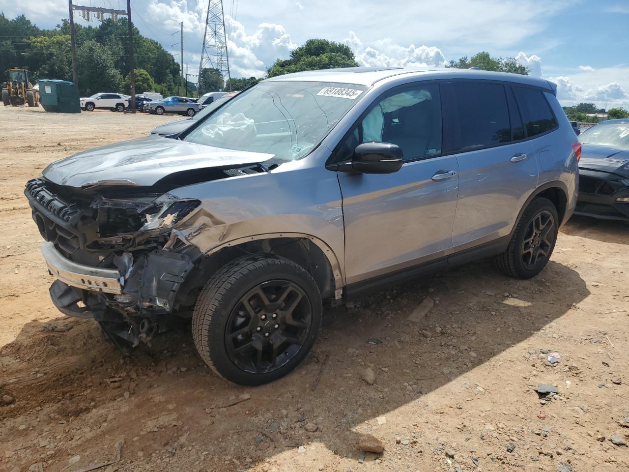 2023 Honda Passport Exl 5FNYF8H59PB029556 photo #1