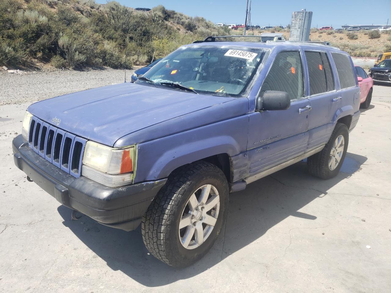 1997 Jeep Grand Cherokee Laredo 1J4GZ58S2VC561372 photo #1