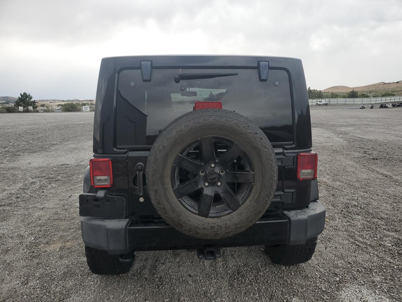 2014 Jeep Wrangler Unlimited Sahara VIN: 1C4HJWEGXEL306329 Lot: 70360195
