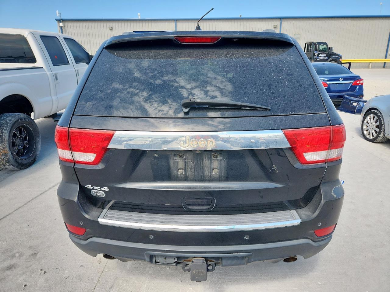2013 Jeep Grand Cherokee Overland VIN: 1C4RJFCT9DC523597 Lot: 64700425