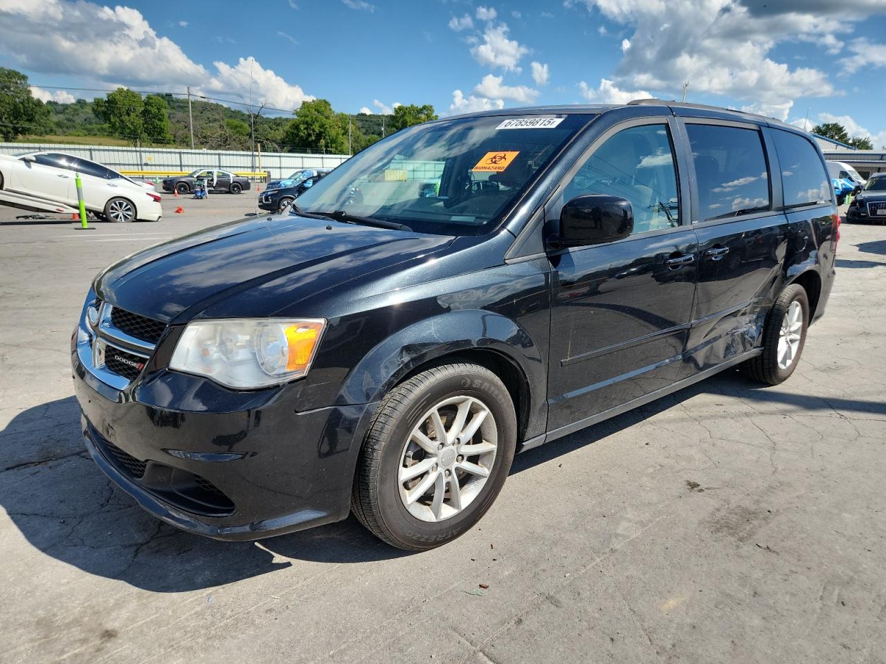 DODGE CARAVAN 2014. Lot# 67859815. VIN 2C4RDGCG6ER242253. Photo 1