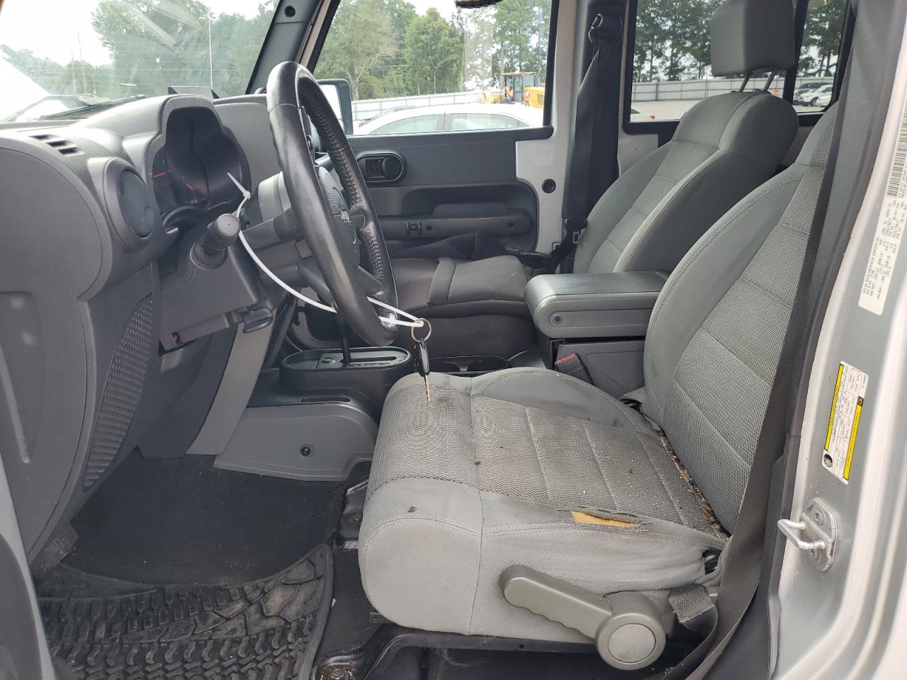 2007 Jeep Wrangler Sahara VIN: 1J4GB59157L143062 Lot: 69699165