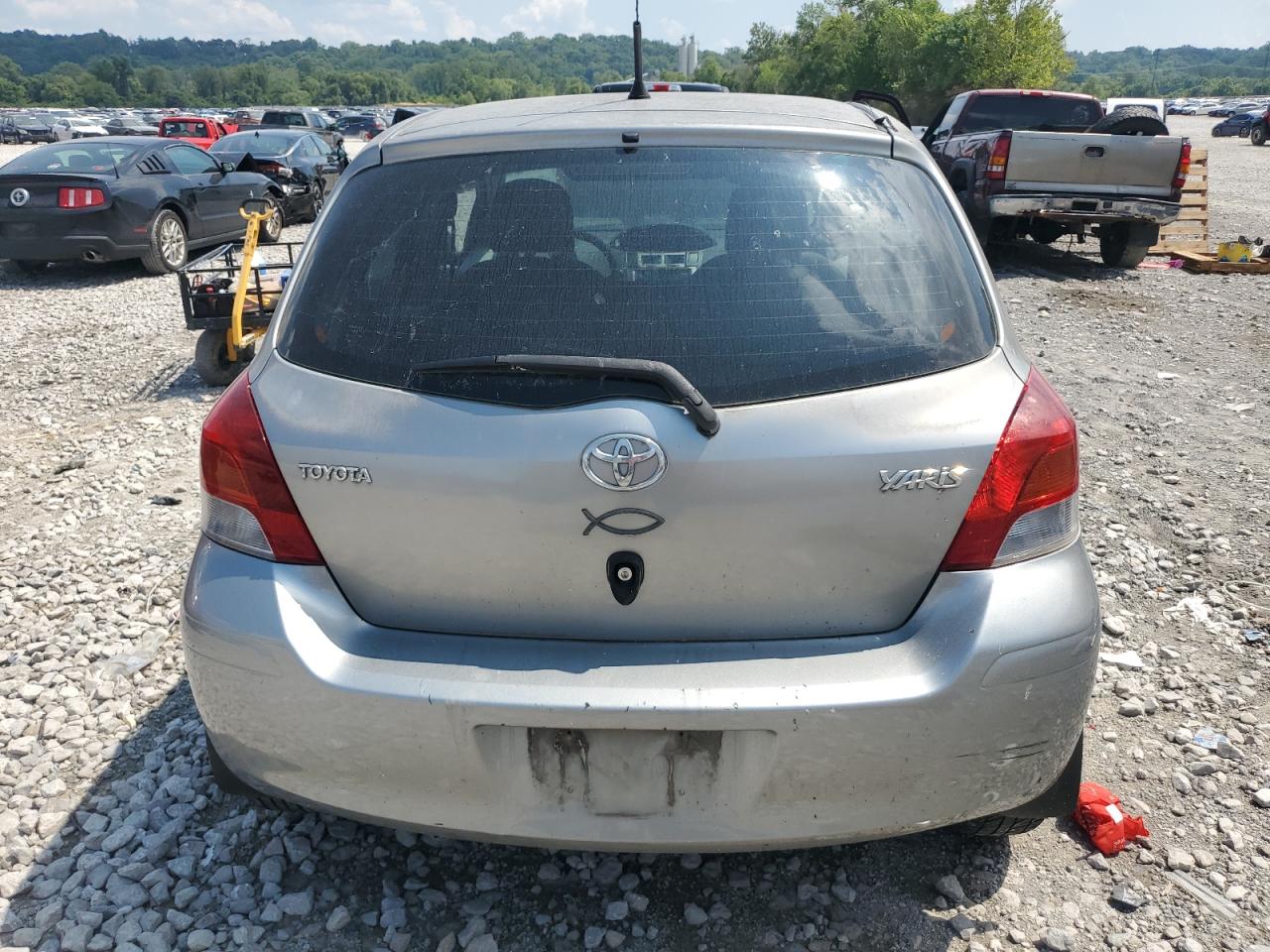 2010 Toyota Yaris VIN: JTDKT4K39A5279421 Lot: 68897535