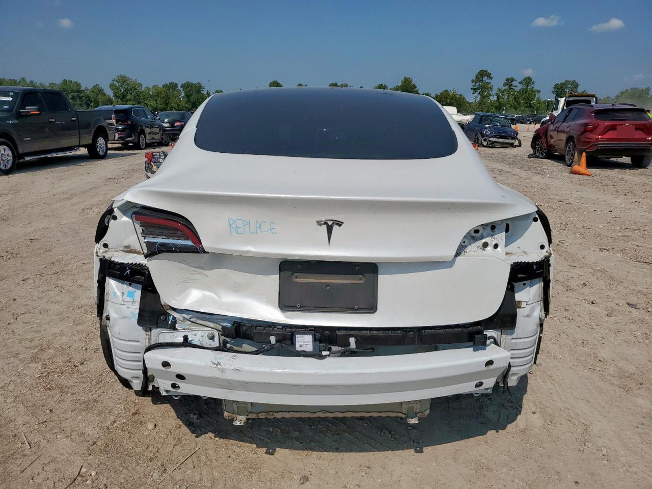 2022 Tesla Model 3 VIN: 5YJ3E1EA1NF321415 Lot: 70197575