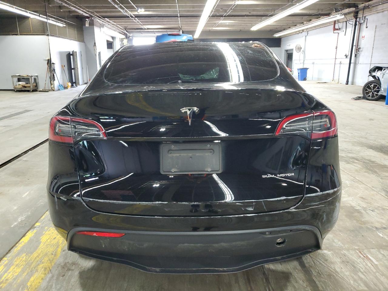 2023 Tesla Model Y VIN: 7SAYGDEE1PF694769 Lot: 68747105