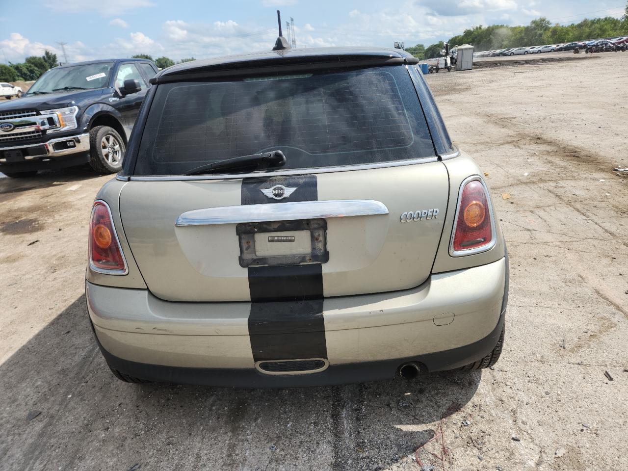 2009 Mini Cooper VIN: WMWMF33509TW75090 Lot: 69759645