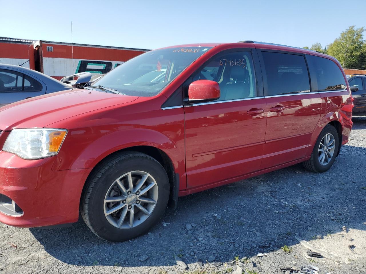 2015 DODGE CARAVAN RED VIN: 2C4RDGBG5FR657776