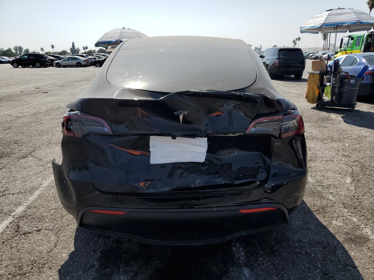 2025 Tesla Model Y VIN: 7SAYGDED2SF308702 Lot: 69092215