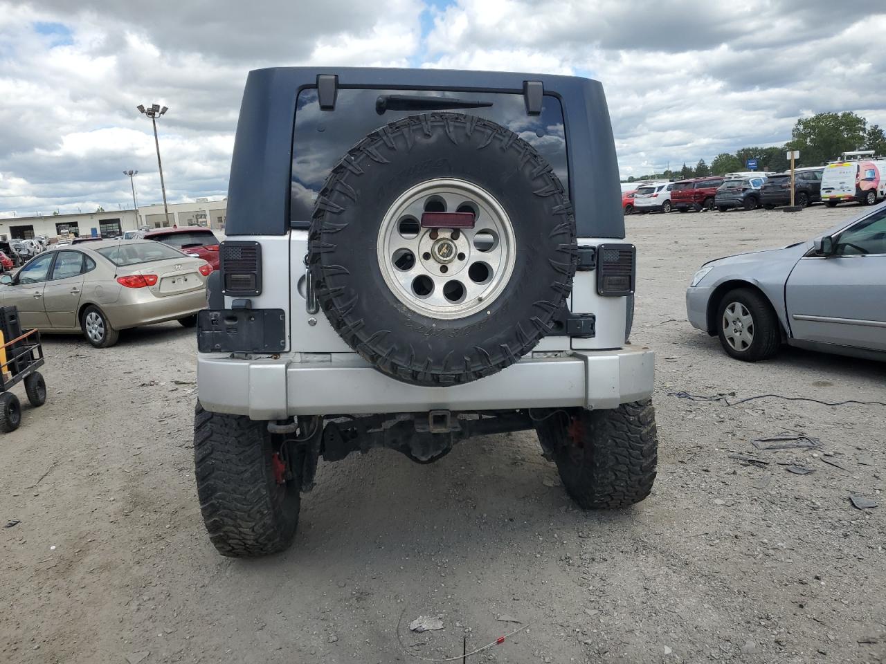 2010 Jeep Wrangler Unlimited Sahara VIN: 1J4BA5H15AL123254 Lot: 69966695