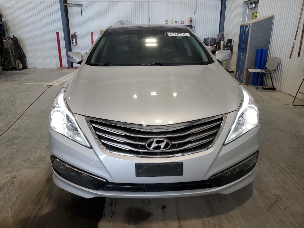 2016 Hyundai Azera Limited VIN: KMHFH4JG2GA550354 Lot: 69770345