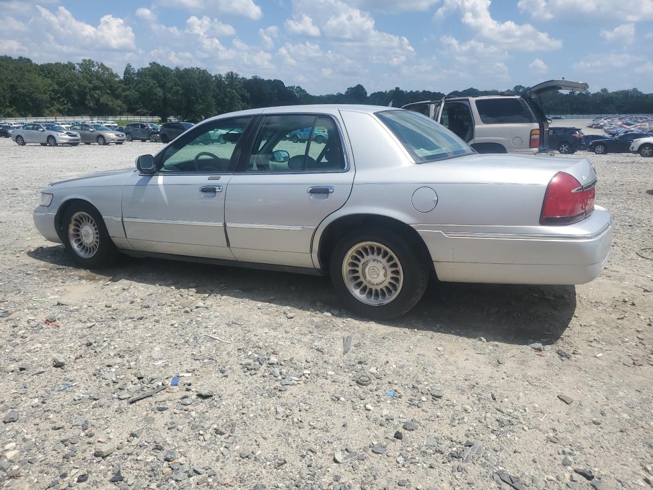 2000 Mercury Grand Marquis Ls silver sedan gas 2MEFM75W8YX623866 photo #3