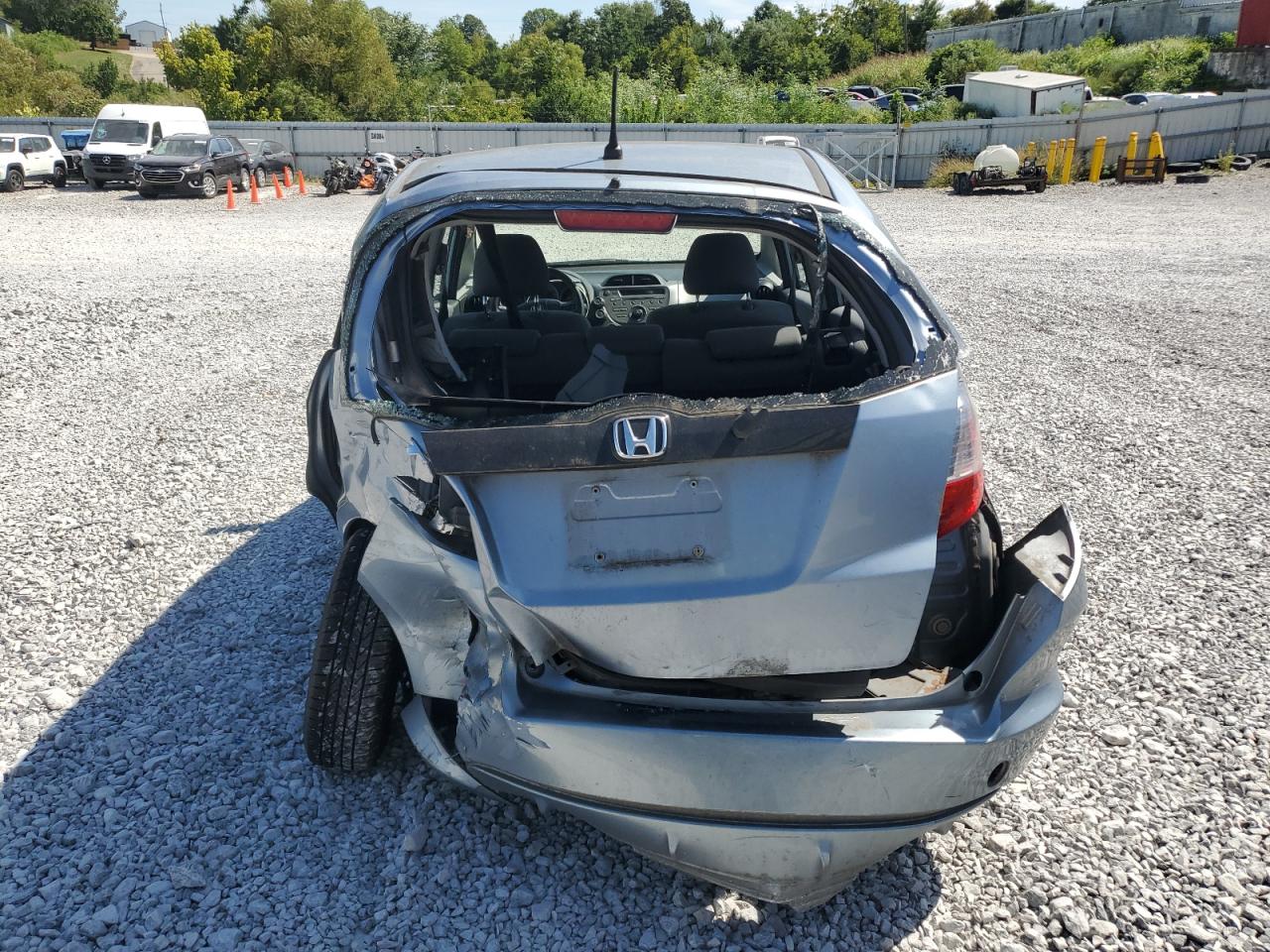 2011 Honda Fit VIN: JHMGE8H33BC018148 Lot: 71025735