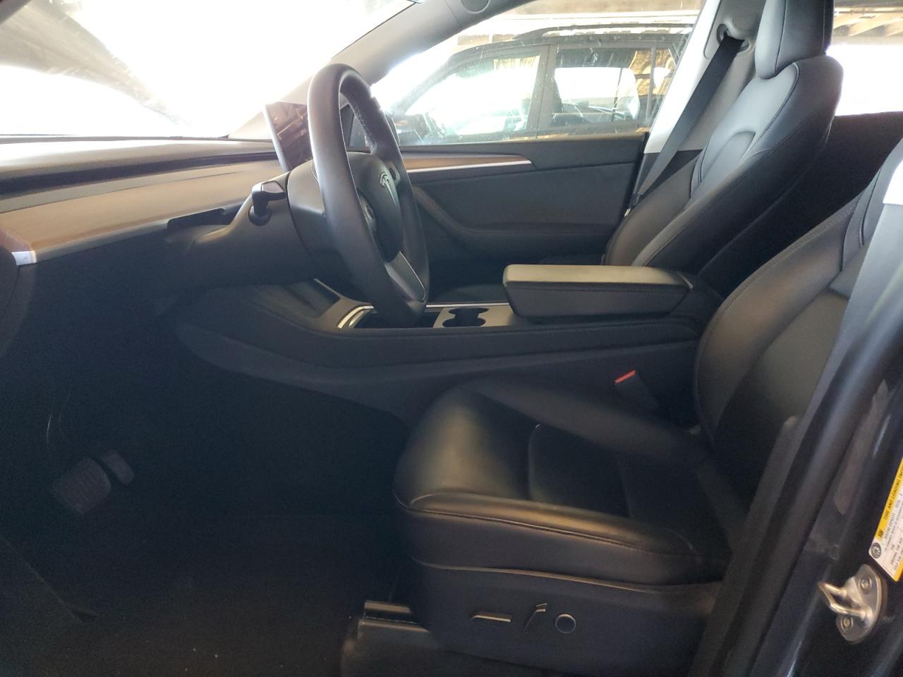 2023 Tesla Model Y VIN: 7SAYGDEE4PF620455 Lot: 65983315