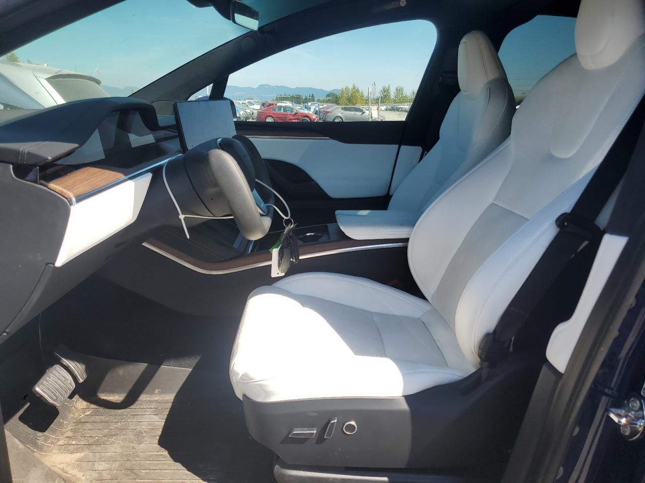 2023 Tesla Model X VIN: 7SAXCBE52PF411615 Lot: 70066735