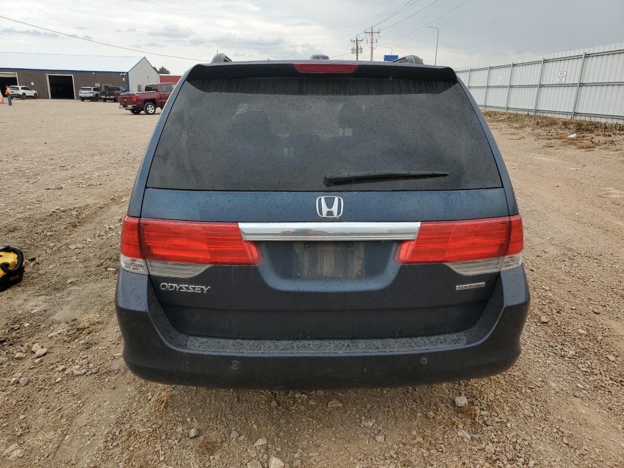 2010 Honda Odyssey Touring VIN: 5FNRL3H95AB072804 Lot: 70865575