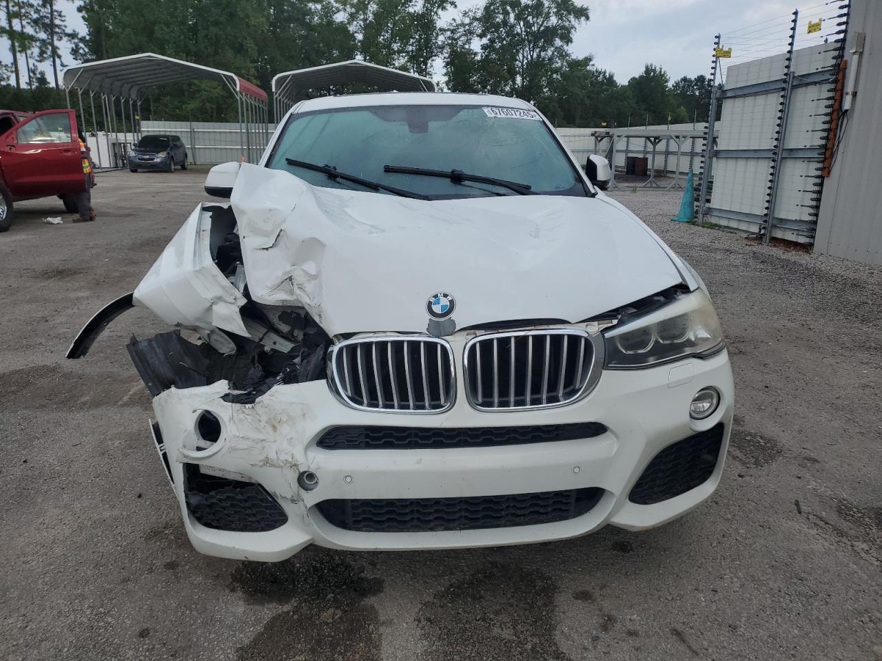 2015 BMW X4 xDrive28I VIN: 5UXXW3C59F0M87857 Lot: 67607245