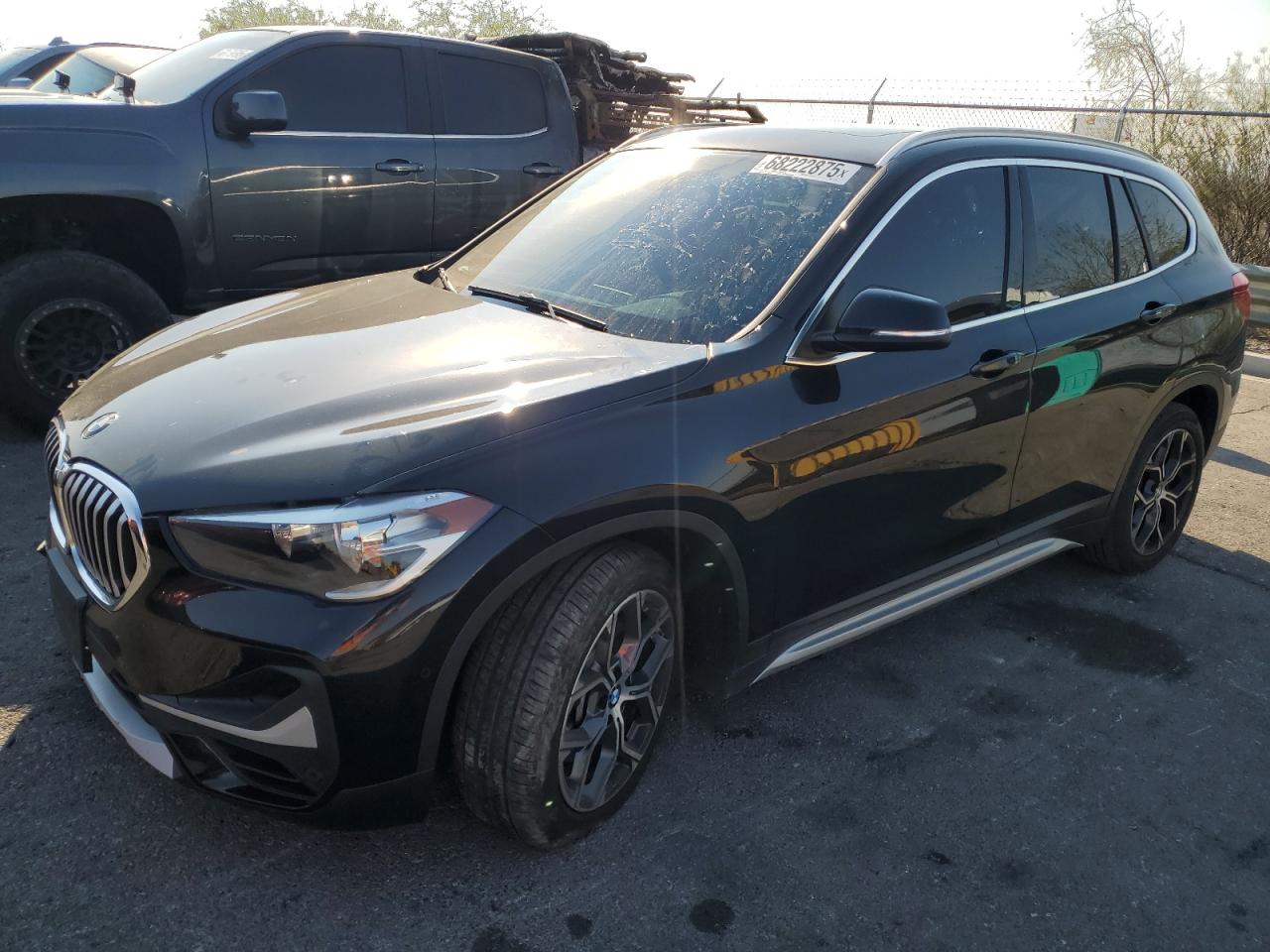 2021 BMW X1 xDrive28I black null gas WBXJG9C07M5T66470 photo #1