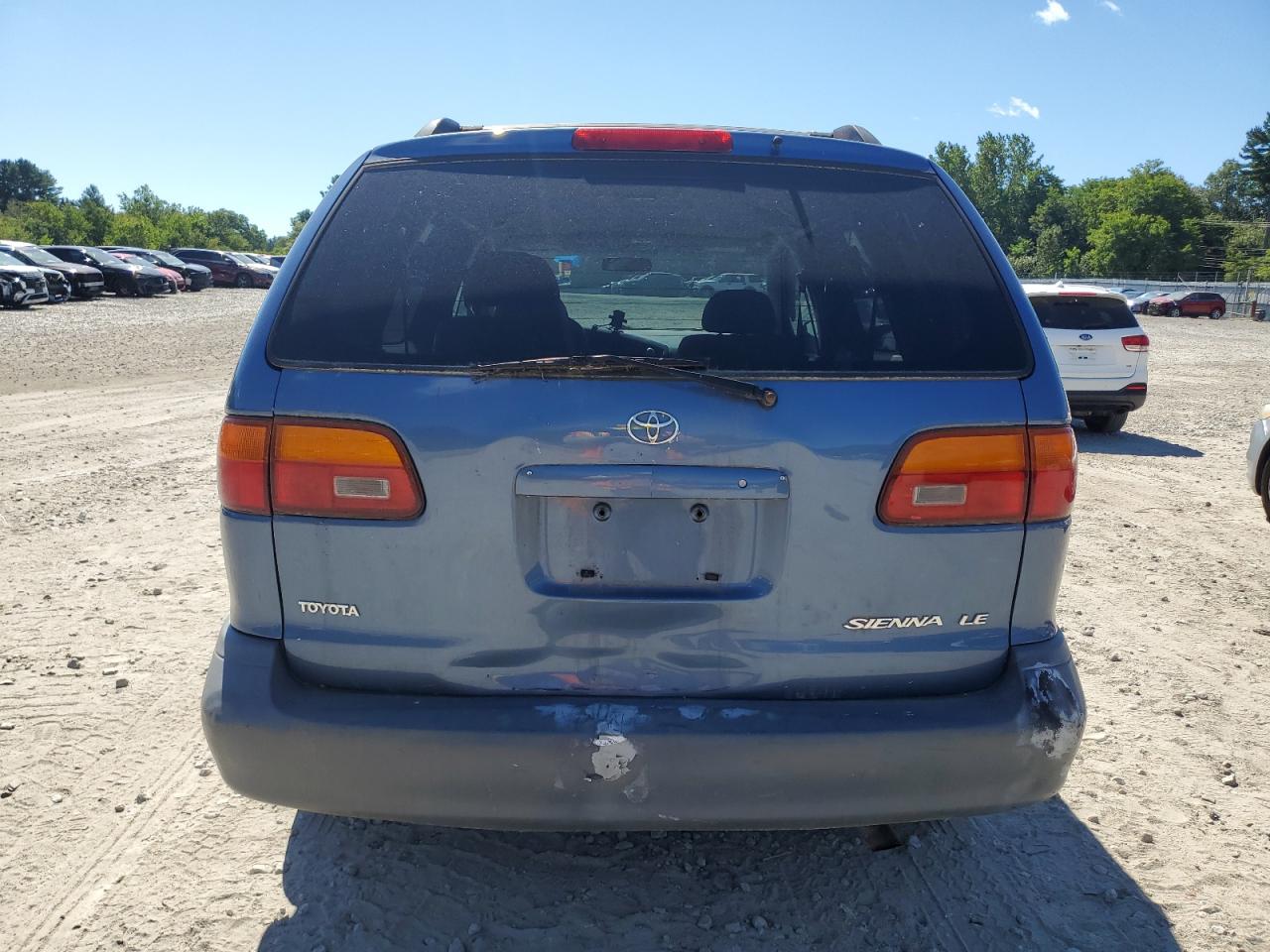 1999 Toyota Sienna Le VIN: 4T3ZF13C3XU092826 Lot: 70525095