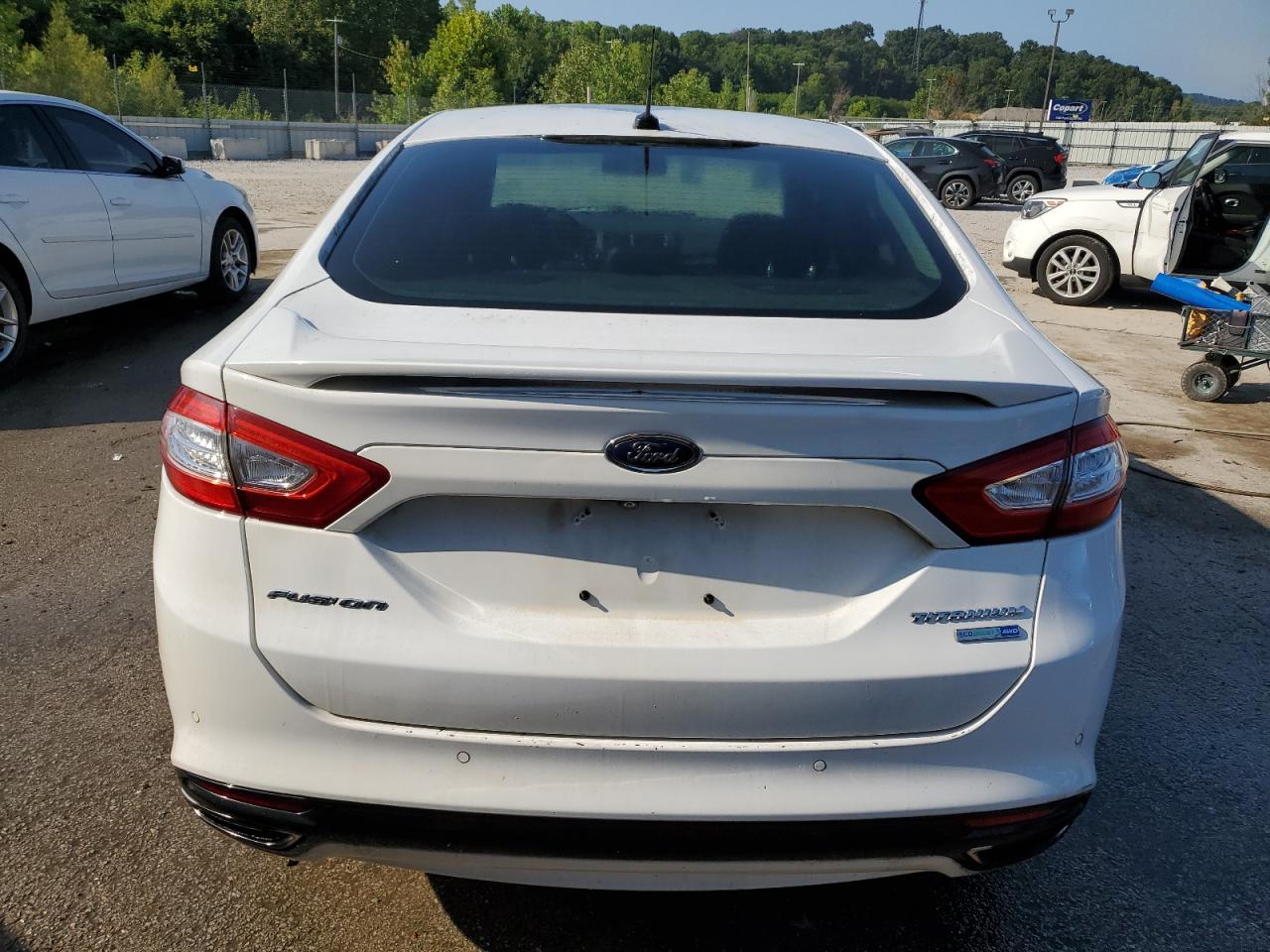 2014 Ford Fusion Titanium VIN: 3FA6P0D91ER107893 Lot: 67768925