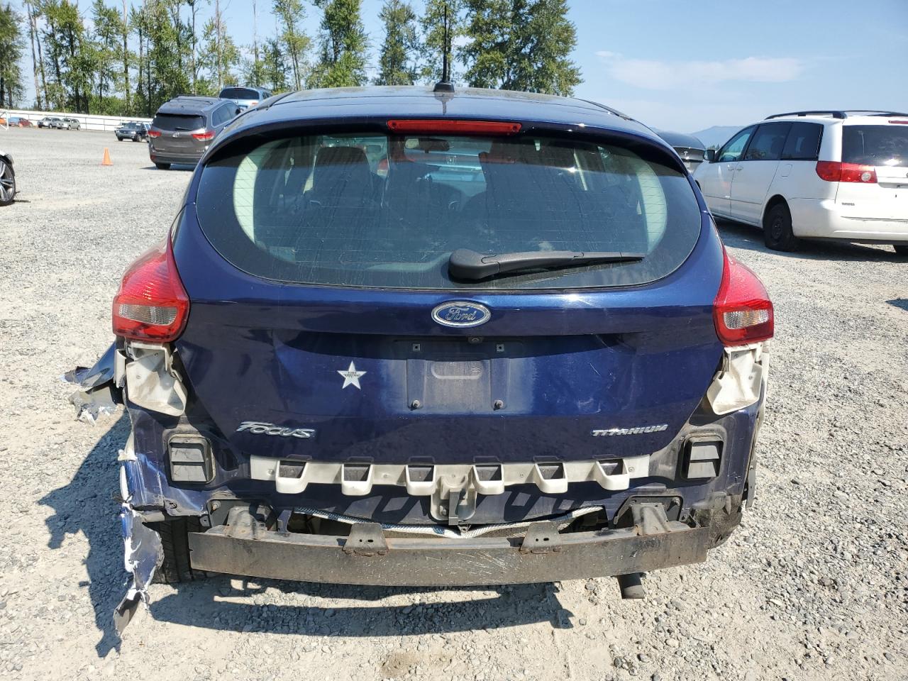 2017 Ford Focus Titanium VIN: 1FADP3N21HL255409 Lot: 70380185