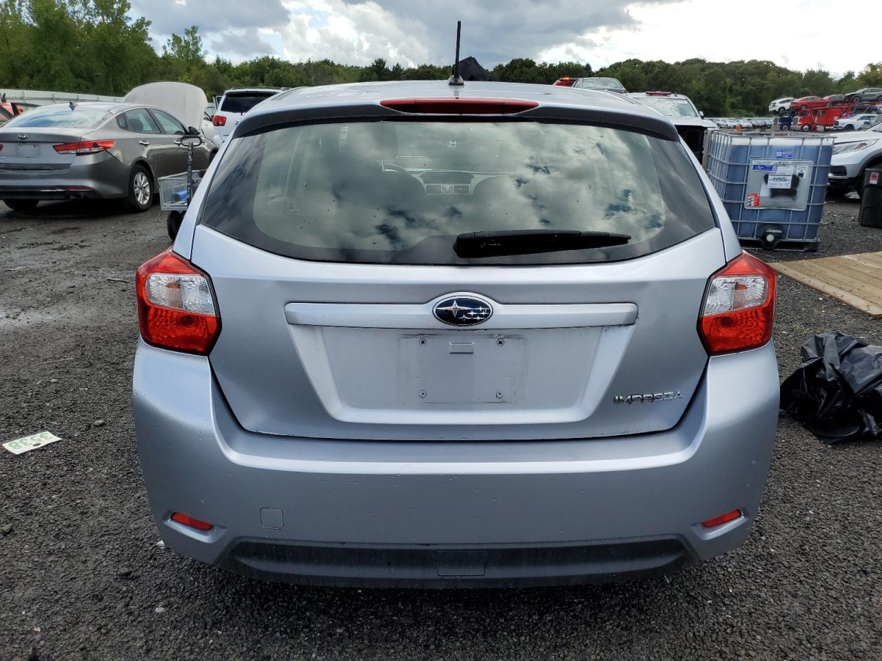 2014 Subaru Impreza VIN: JF1GPAA68E8224702 Lot: 70570245