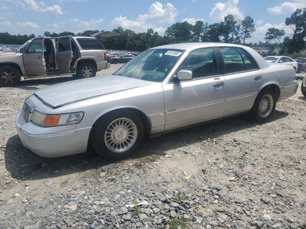 2000 Mercury Grand Marquis Ls silver sedan gas 2MEFM75W8YX623866 photo #1