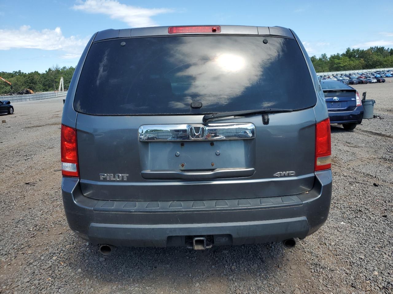 2011 Honda Pilot Lx VIN: 5FNYF4H21BB061327 Lot: 70053665